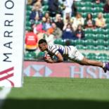 Aaron Philip diving to score between the posts.